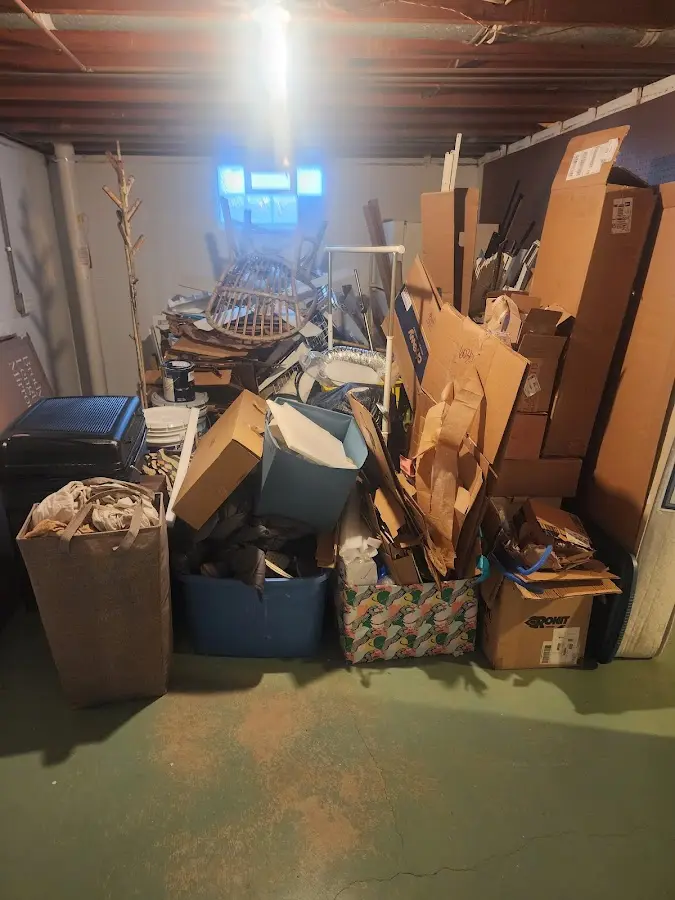 Roll-off dumpster container at job site for 4 Yard Dumpster Rental in Triana